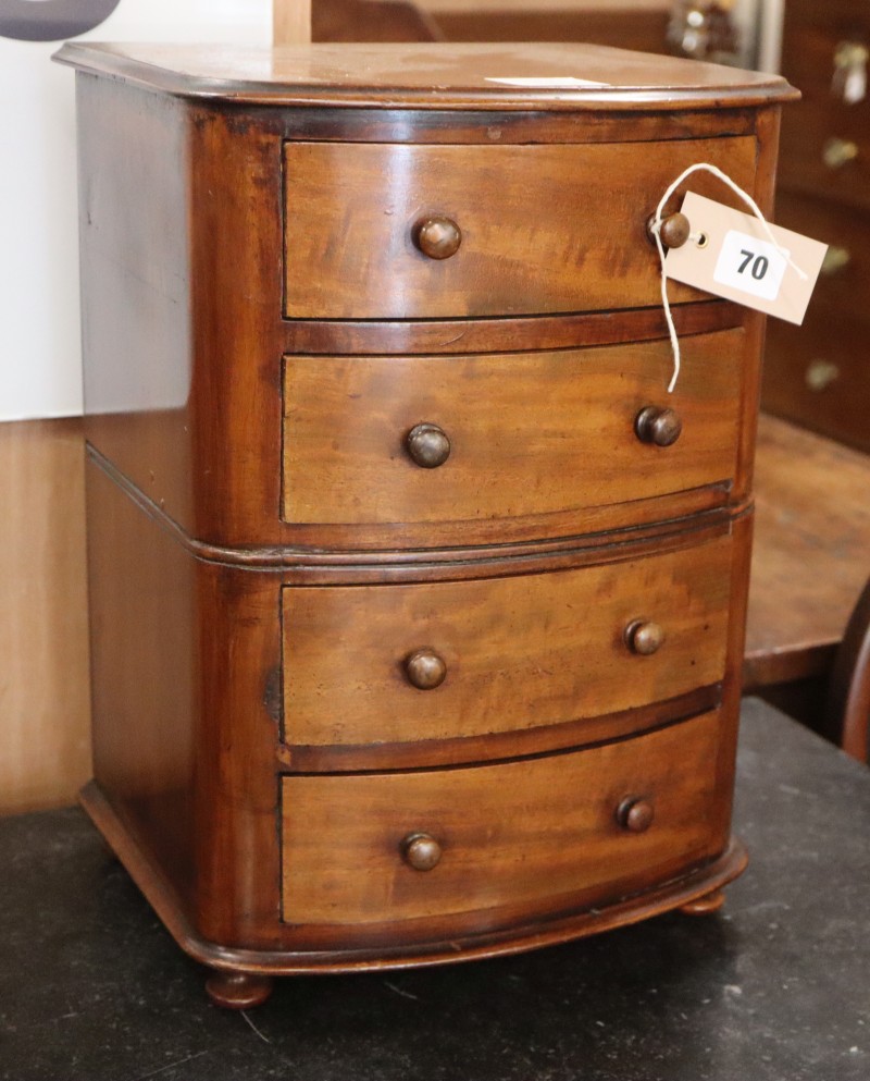 A mahogany bowfronted miniature chest of drawers, W.28cm, D.24cm, H.40cm